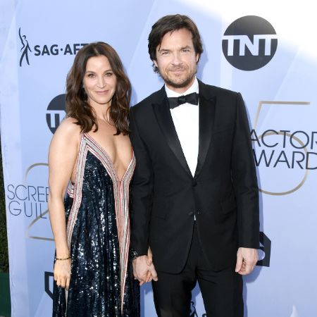Amanda and Jason looking great in black dress